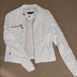 White leather jacket by George Palomares